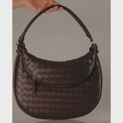 Elegante Schultertasche mit geflochtenem Lederdesign