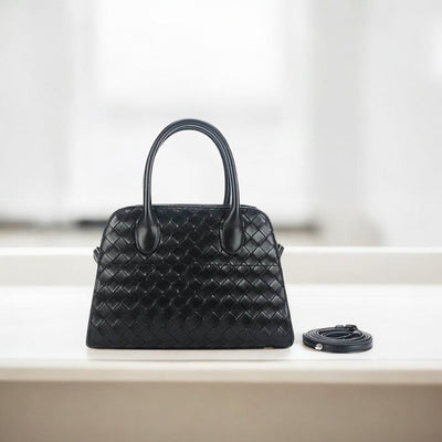Elegante Handtasche mit geflochtenem Design und abnehmbarem Riemen
