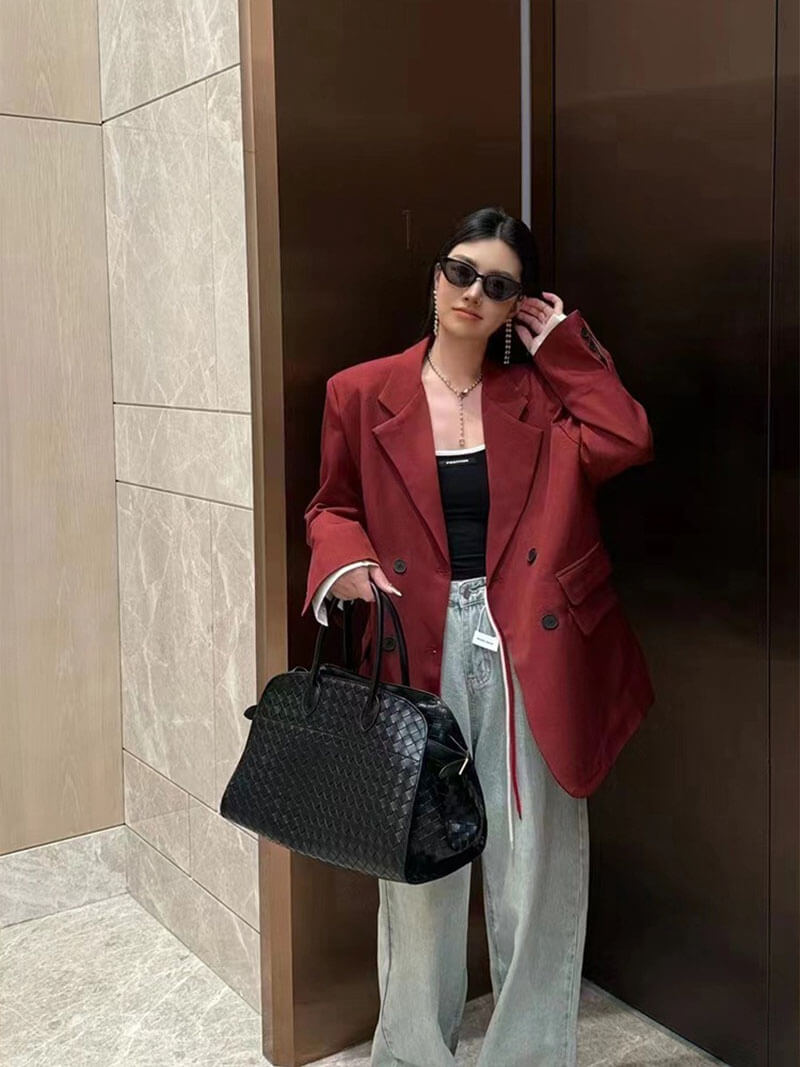 Elegante Handtasche mit geflochtenem Design und abnehmbarem Riemen