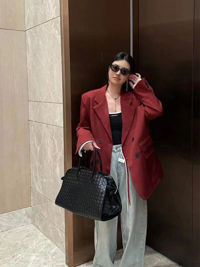 Elegante Handtasche mit geflochtenem Design und abnehmbarem Riemen