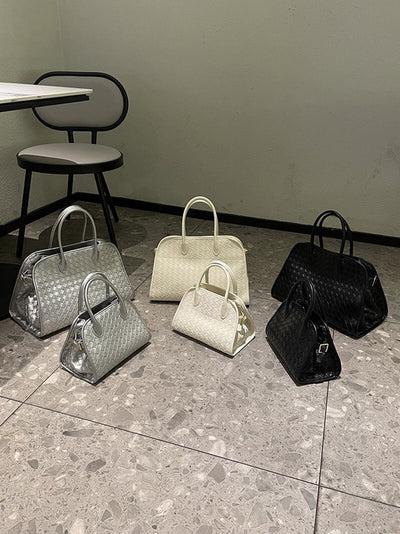 Elegante Handtasche mit geflochtenem Design und abnehmbarem Riemen