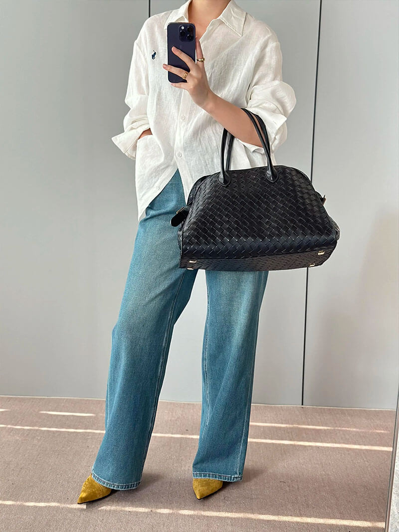 Elegante Handtasche mit geflochtenem Design und abnehmbarem Riemen