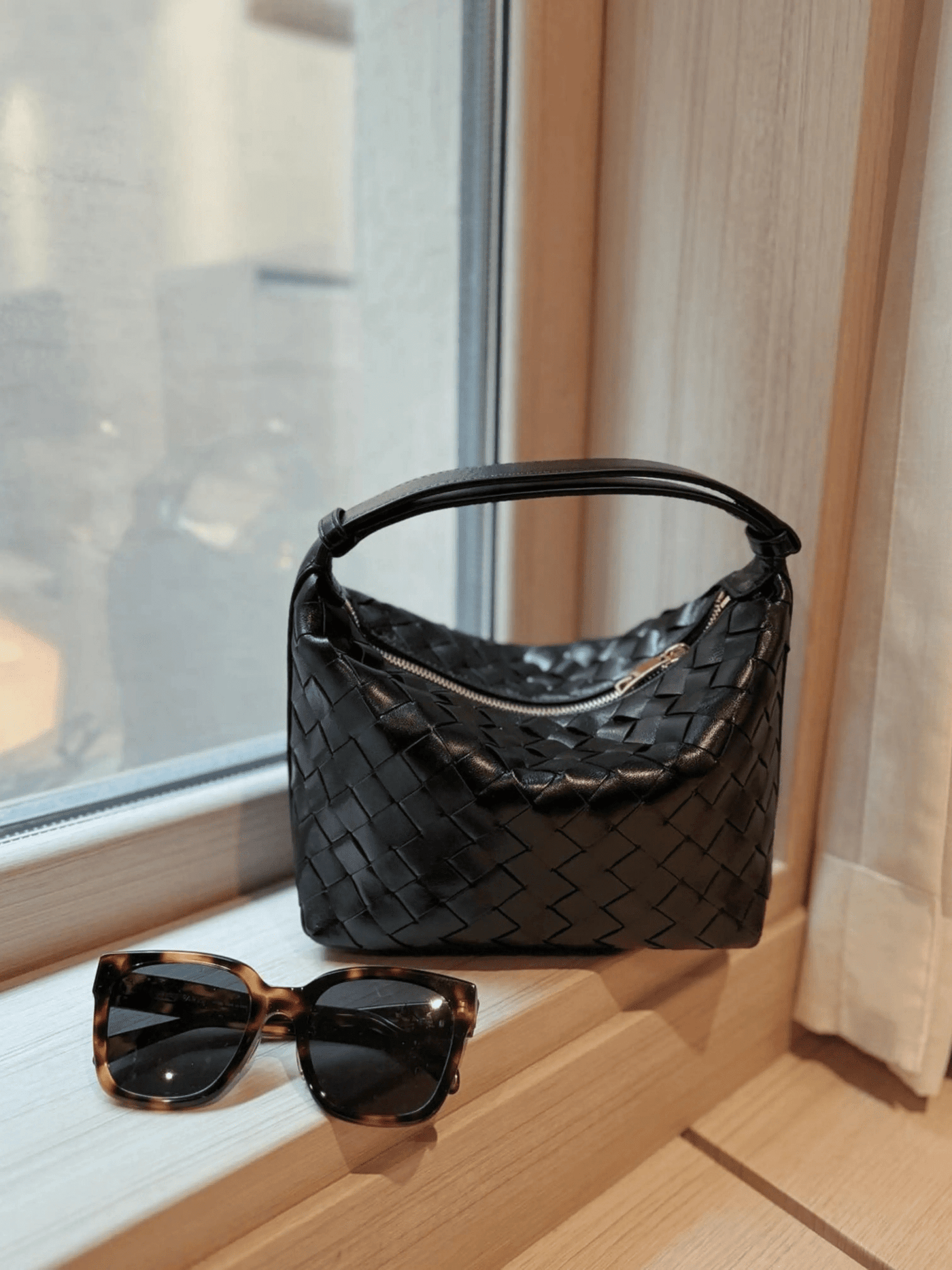 Luxuriöse Handtasche mit geflochtenem Lederdesign