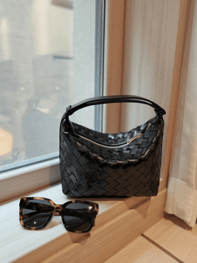 Luxuriöse Handtasche mit geflochtenem Lederdesign