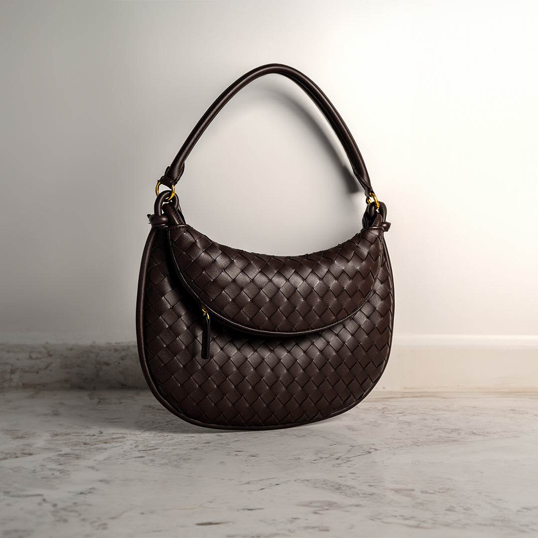 Elegante Schultertasche mit geflochtenem Lederdesign